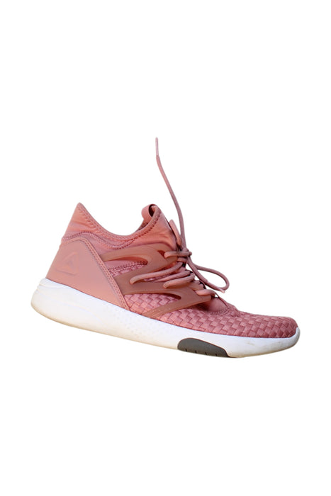 A Pink Sneakers from Reebok in size 12Y for girl. (Front View)
