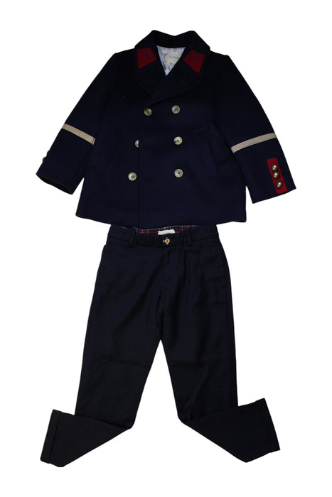 A Navy Pants Sets from Gucci in size 6T for boy. (Front View)
