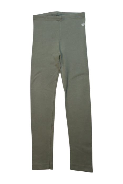 A Green Leggings from Petit Bateau in size 4T for girl. (Front View)