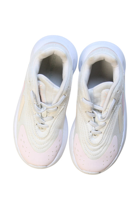 A White Sneakers from Adidas in size 6T for girl. (Back View)