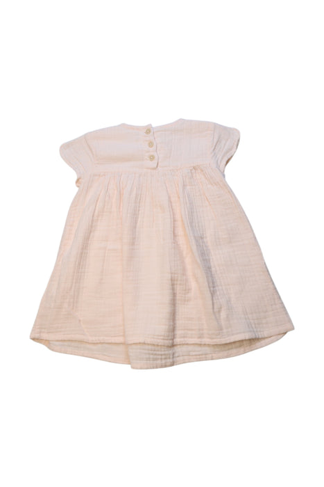 A Ivory Short Sleeve Dresses from Louis Louise in size 6-12M for girl. (Back View)