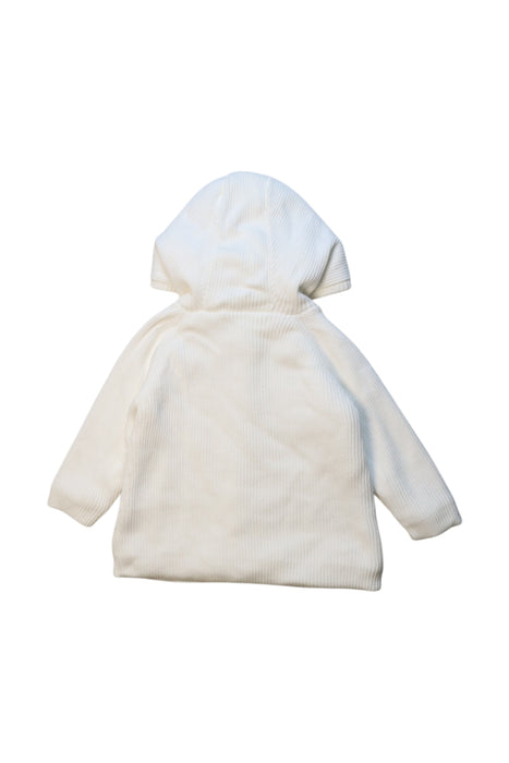 A White Coats from Seed in size 6-12M for girl. (Back View)