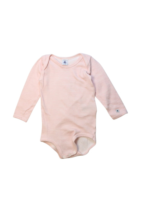 A Pink Long Sleeve Bodysuits from Petit Bateau in size 18-24M for girl. (Front View)