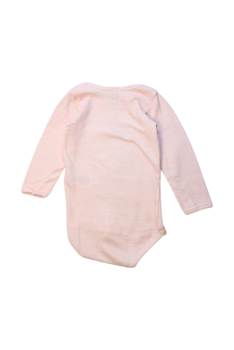 A Pink Long Sleeve Bodysuits from Petit Bateau in size 18-24M for girl. (Back View)