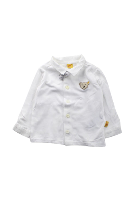 A White Long Sleeve Shirts from Steiff in size 3-6M for neutral. (Front View)
