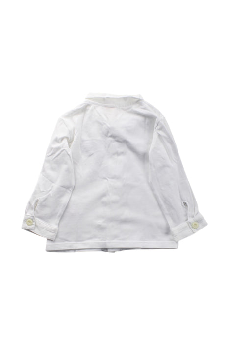 A White Long Sleeve Shirts from Steiff in size 3-6M for neutral. (Back View)