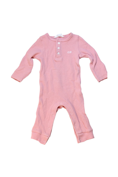 A Pink Long Sleeve Rompers from Country Road in size 0-3M for girl. (Front View)