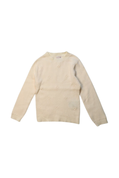 A Ivory Long Sleeve Tops from Petit Main in size 2T for girl. (Front View)