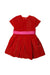 A Red Short Sleeve Dresses from Jacadi in size 4T for girl. (Front View)