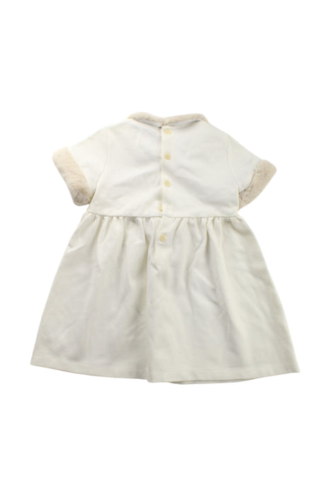 A Ivory Short Sleeve Dresses from Il Gufo in size 2T for girl. (Back View)