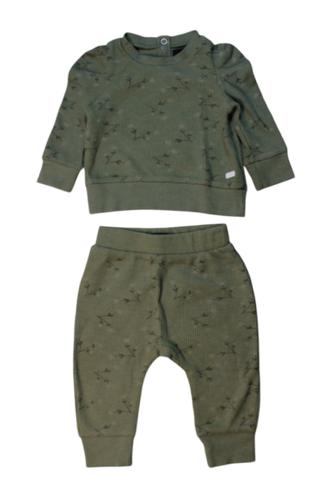 A Green Pants Sets from 7 For All Mankind in size 6-12M for girl. (Front View)