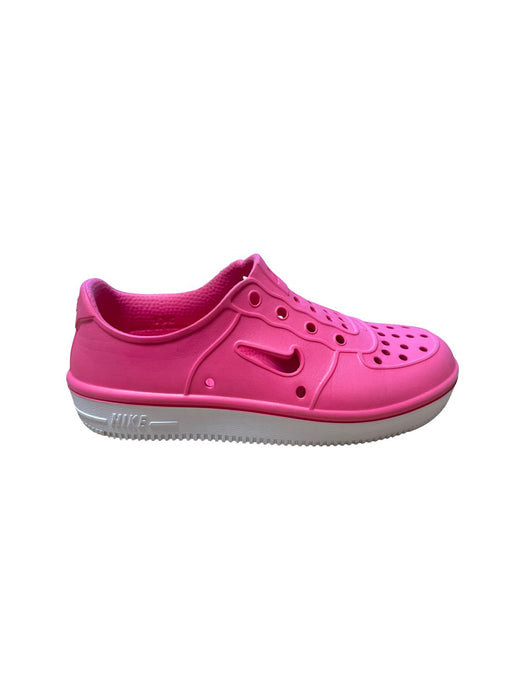 A Pink Slip Ons from Nike in size 6T for girl. (Front View)