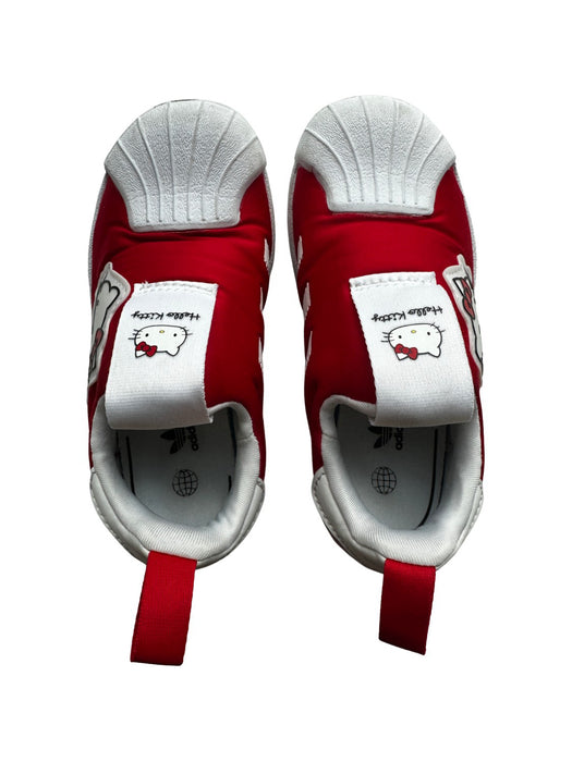 A Red Sneakers from Adidas in size 5T for girl. (Front View)