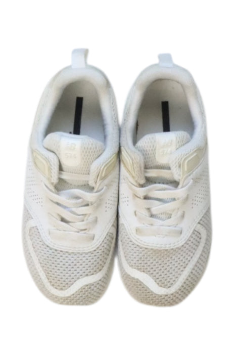 A White Sneakers from New Balance in size 4T for neutral. (Back View)