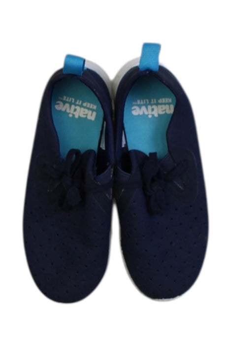 A Navy Slip Ons from Native Shoes in size 6T for boy. (Back View)