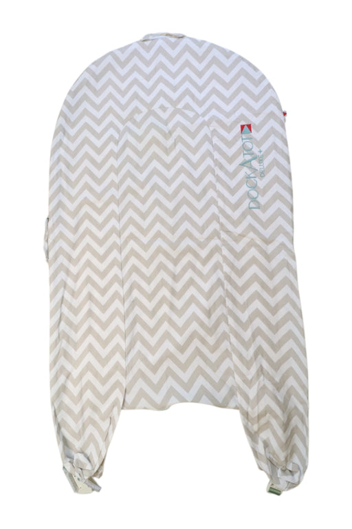 A Beige Changing Mats & Covers from DockATot in size O/S for neutral. (Front View)