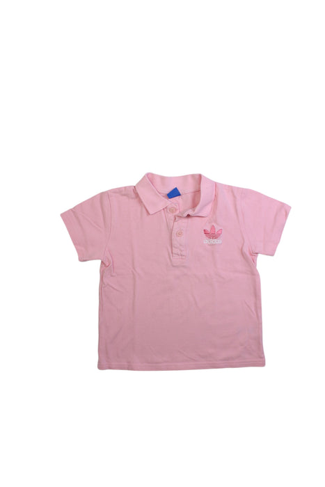 A Pink Short Sleeve Polos from Adidas in size 5T for girl. (Front View)