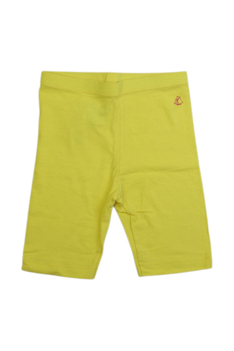 A Yellow Leggings from Petit Bateau in size 6T for girl. (Front View)