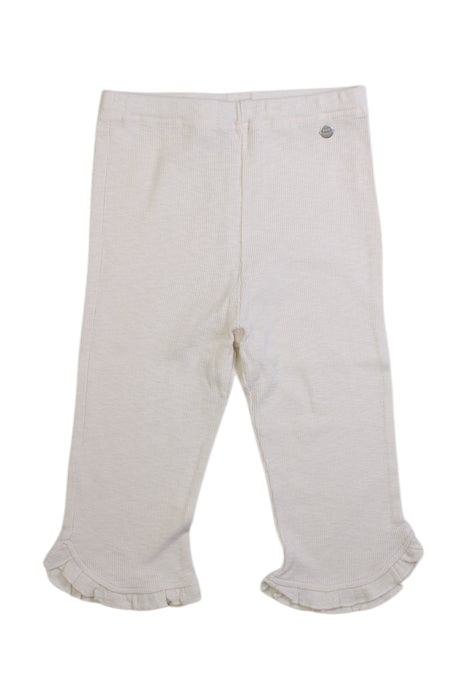 A Ivory Leggings from Petit Main in size 6T for girl. (Front View)