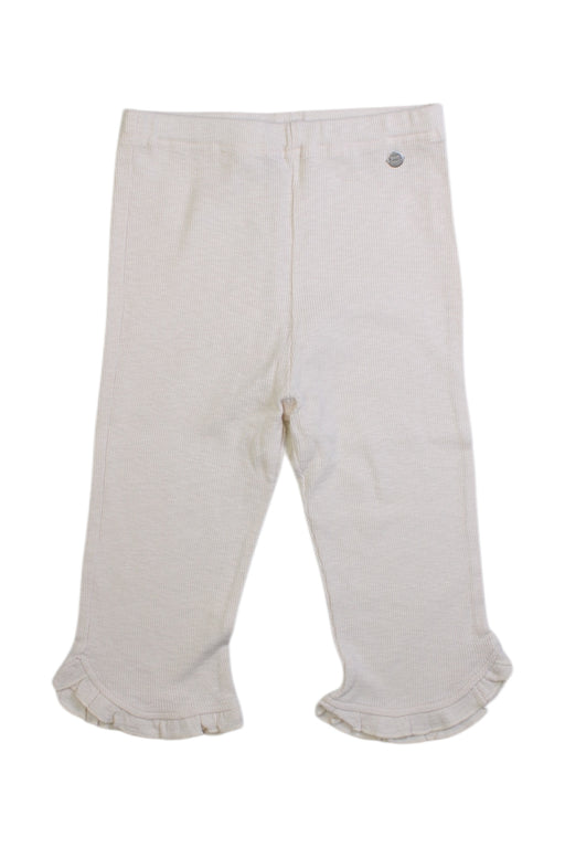 A Ivory Leggings from Petit Main in size 6T for girl. (Front View)