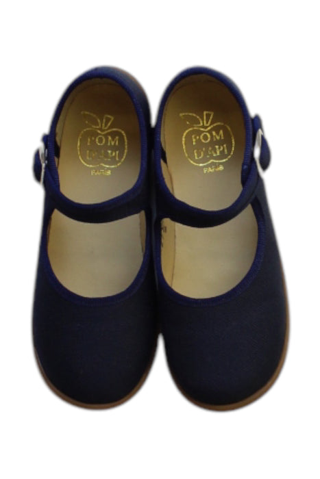 A Navy Flats from Pom d’Api in size 4T for girl. (Back View)