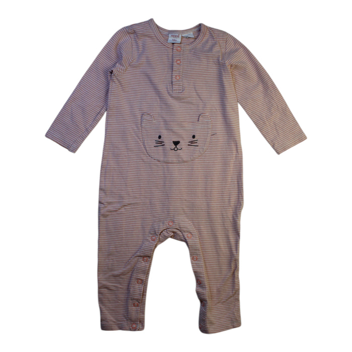 A Beige Long Sleeve Rompers from Seed in size 12-18M for girl. (Front View)