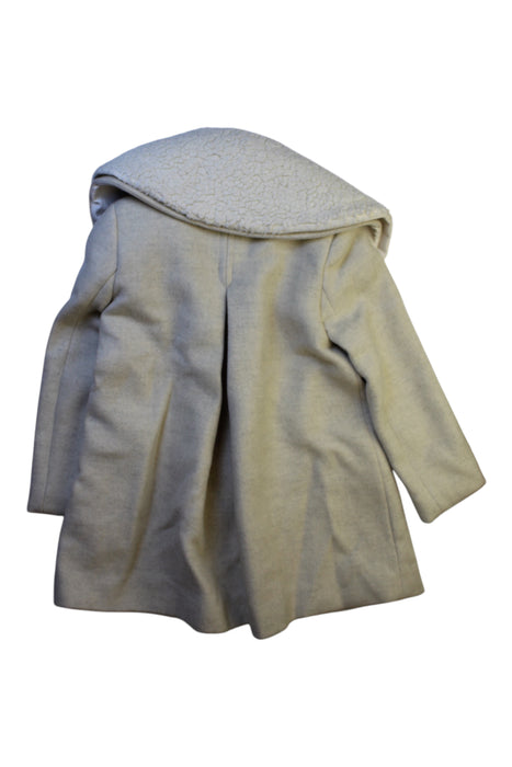 A Ivory Coats from Gannino d'Angelo in size 5T for girl. (Back View)