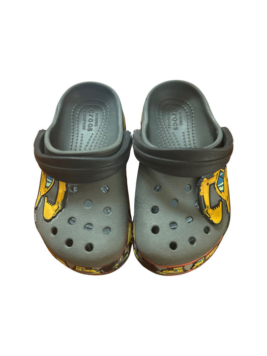 A Grey Slip Ons from Crocs in size 3T for boy. (Front View)
