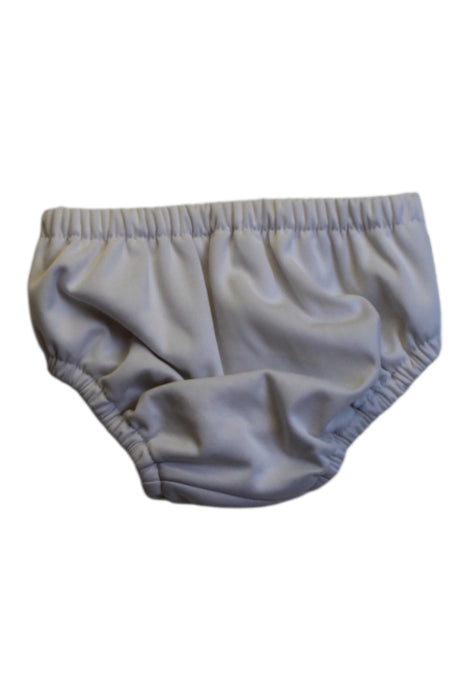 A White Swim Diapers from Charlie Banana in size 6-12M for girl. (Back View)