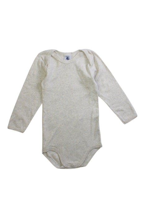 A Beige Long Sleeve Bodysuits from Petit Bateau in size 2T for neutral. (Front View)