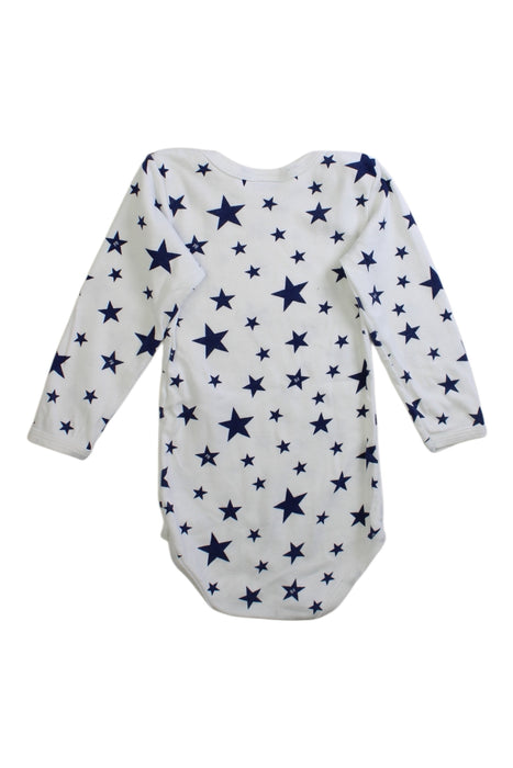A White Long Sleeve Bodysuits from Petit Bateau in size 2T for neutral. (Back View)