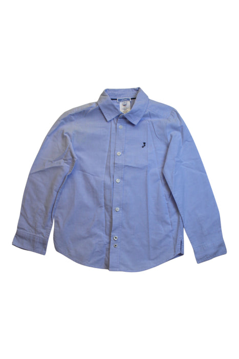 A Blue Long Sleeve Shirts from Jacadi in size 6T for boy. (Front View)
