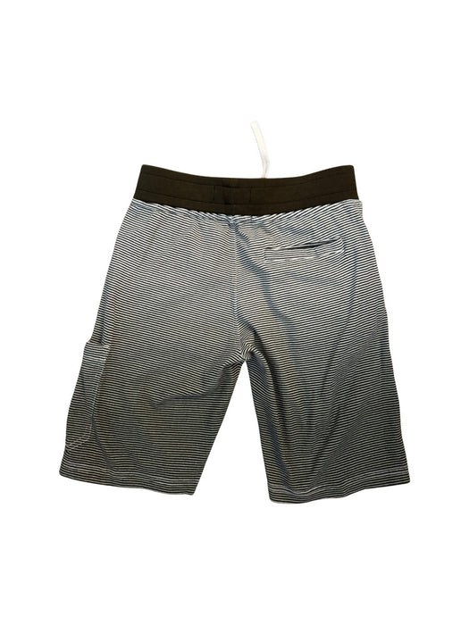 A Green Shorts from Stone Island in size 6T for neutral. (Back View)