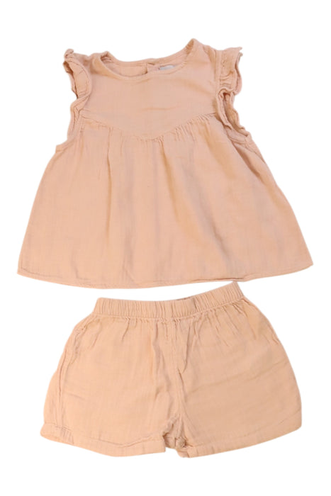 A Peach Sleeveless Dresses from Petit Bateau in size 3T for girl. (Front View)