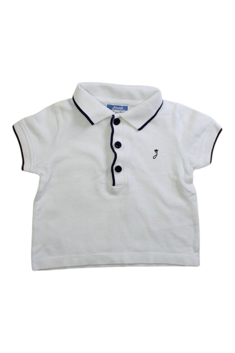 A White Short Sleeve Polos from Jacadi in size 3-6M for boy. (Front View)