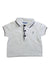 A White Short Sleeve Polos from Jacadi in size 3-6M for boy. (Front View)
