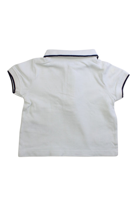 A White Short Sleeve Polos from Jacadi in size 3-6M for boy. (Back View)