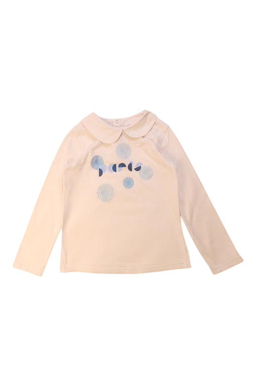 A Ivory Long Sleeve Tops from Jacadi in size 6T for girl. (Front View)