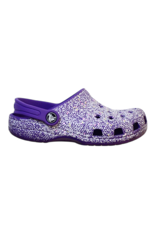 A Purple Slip Ons from Crocs in size 6T for girl. (Front View)
