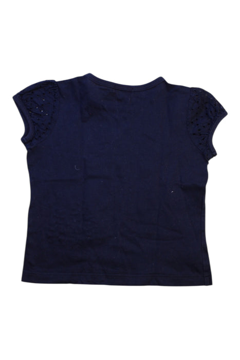 A Navy Short Sleeve Tops from Familiar in size 4T for girl. (Back View)