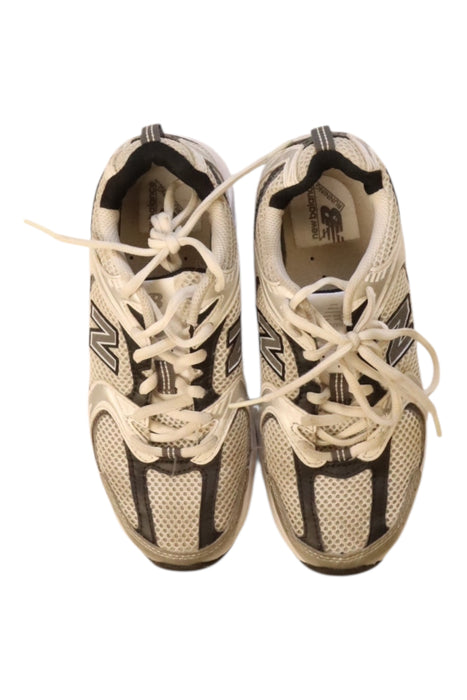 A White Sneakers from New Balance in size 11Y for neutral. (Back View)