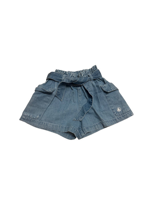 A Blue Shorts from Petit Bateau in size 5T for girl. (Front View)
