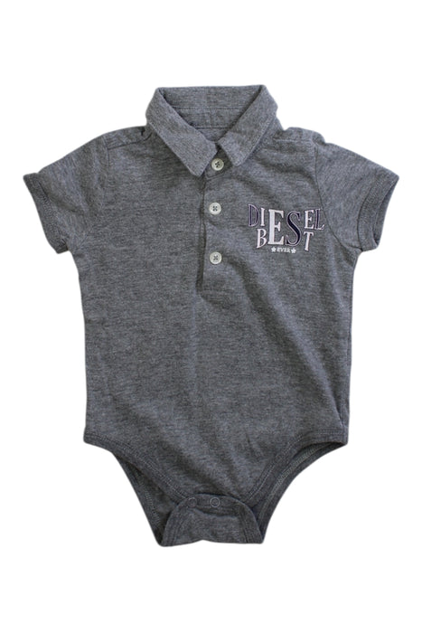 A Grey Short Sleeve Bodysuits from Diesel in size 6-12M for girl. (Front View)