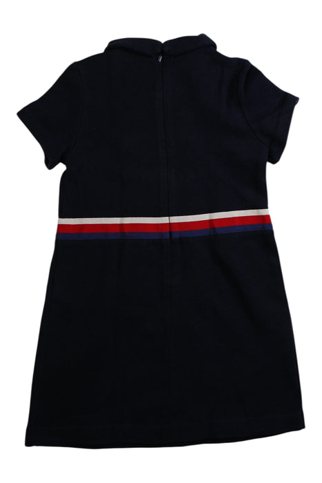 A Navy Short Sleeve Dresses from Gucci in size 5T for girl. (Back View)