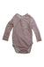 A Pink Long Sleeve Bodysuits from Burrow & Be in size 6-12M for girl. (Front View)