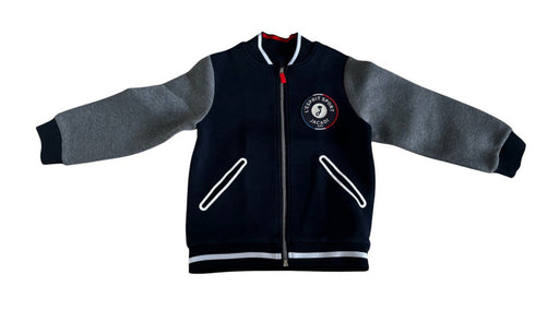 A Navy Lightweight Jackets from Jacadi in size 6T for boy. (Front View)