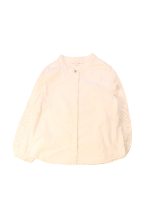 A White Lightweight Jackets from Chloe in size 4T for girl. (Front View)