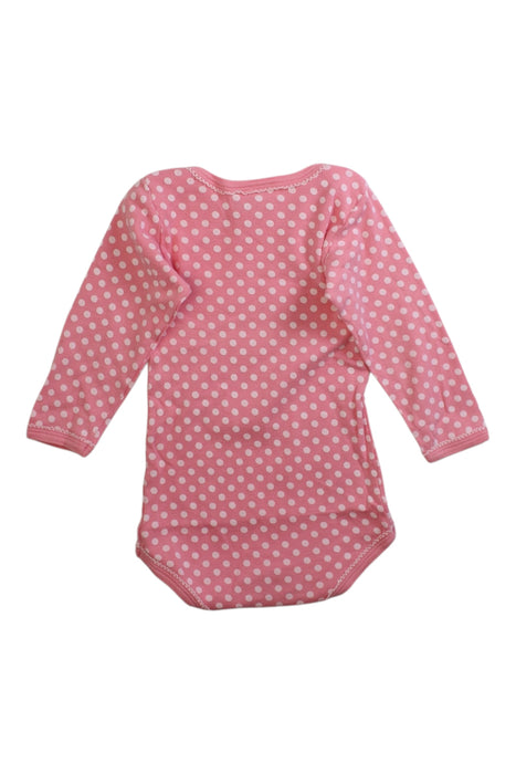 A Pink Long Sleeve Bodysuits from Petit Bateau in size 6-12M for girl. (Back View)