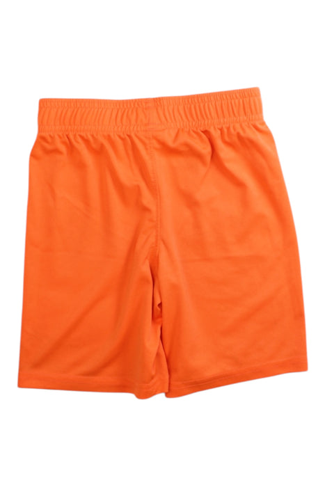A Orange Shorts from Under Armour in size 5T for boy. (Back View)