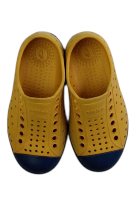 A Yellow Slip Ons from Native Shoes in size 3T for boy. (Back View)